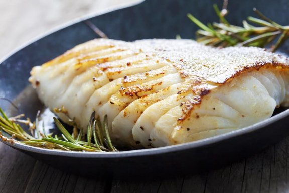 D Licieux Loup De Mer Au Four Avec Pommes De Terre Et Oignons