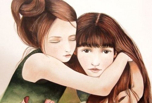 jeune fille qui embrasse sa soeur 