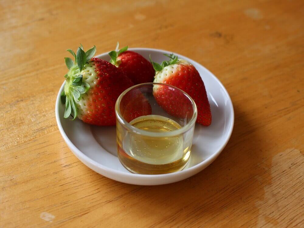Traitement d'huile d'olive et fraises.