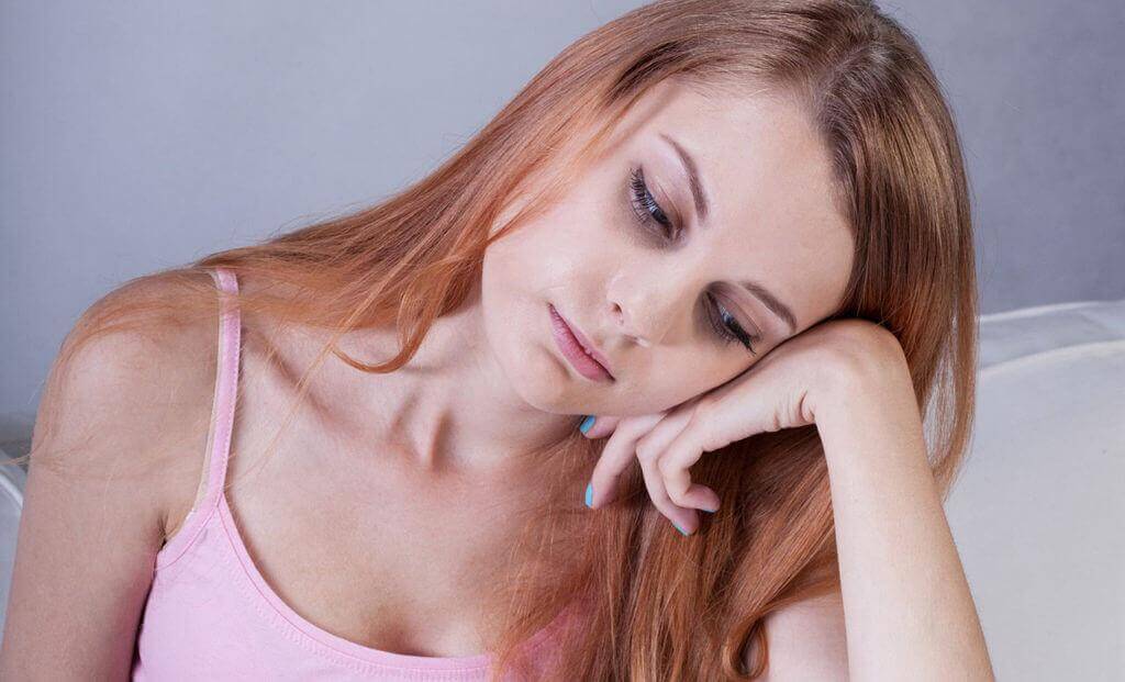 Femme qui ne se sent pas bien