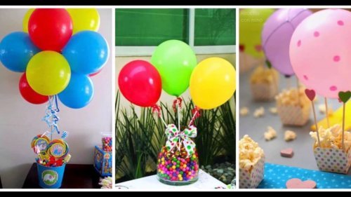 des ballons sur une table style candy bar