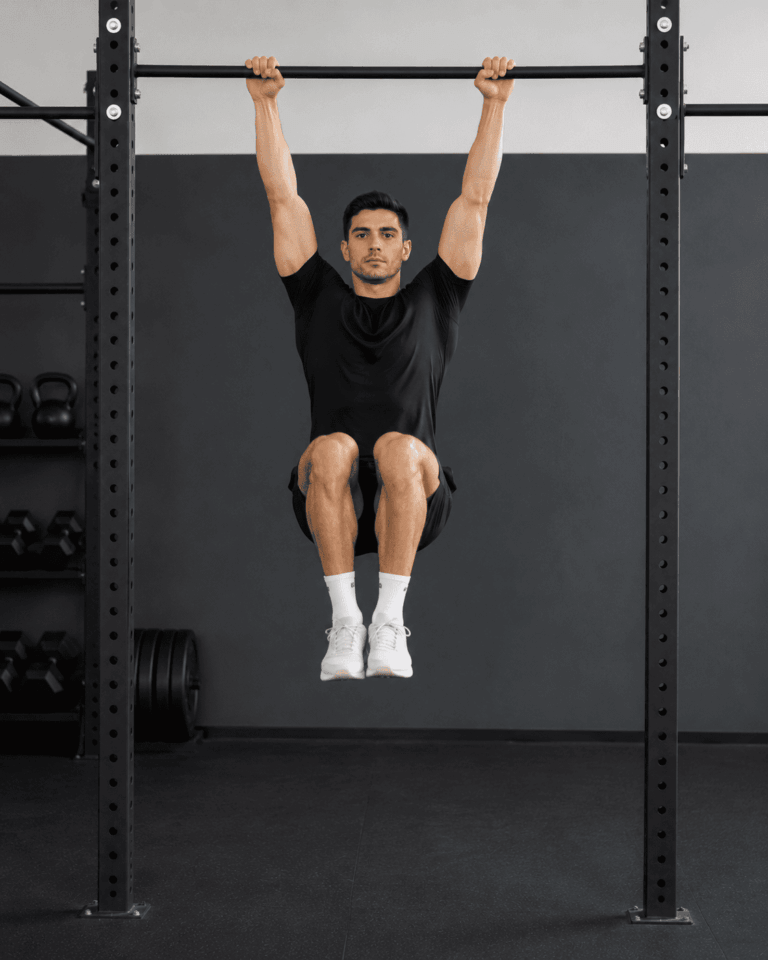 Un exercice exigeant qui combine la force de votre prise à la barre avec une contraction intense du bas-ventre.